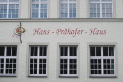 Schriftzug mit Sonnenradlogo